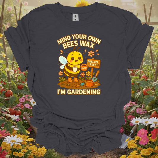 Charcoal tee showing busy honeybee with mind your own beeswax message for pollinator supporters