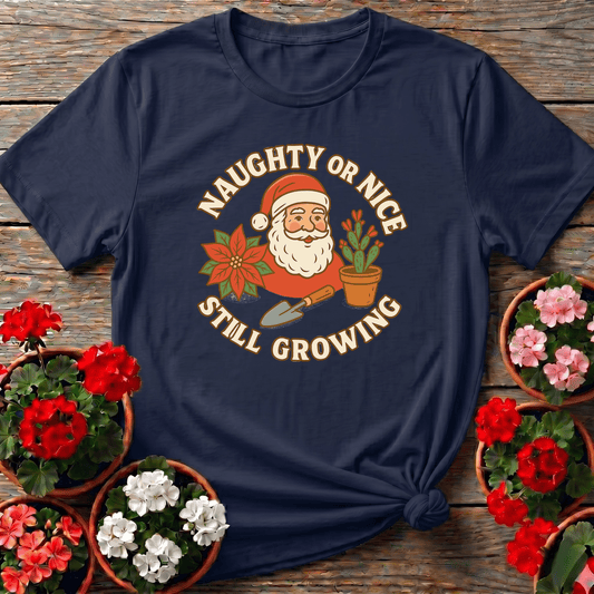 Navy retro Americana Christmas gardening t-shirt with "Naughty or Nice Still Growing" for gardeners