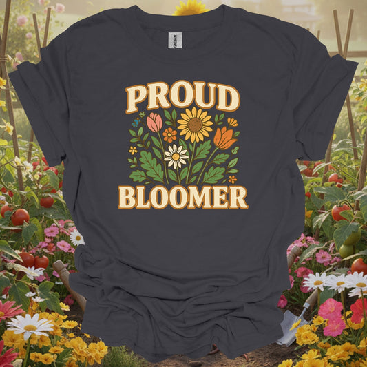 Charcoal tee showing proud bloomer floral bouquet slogan for plant lovers