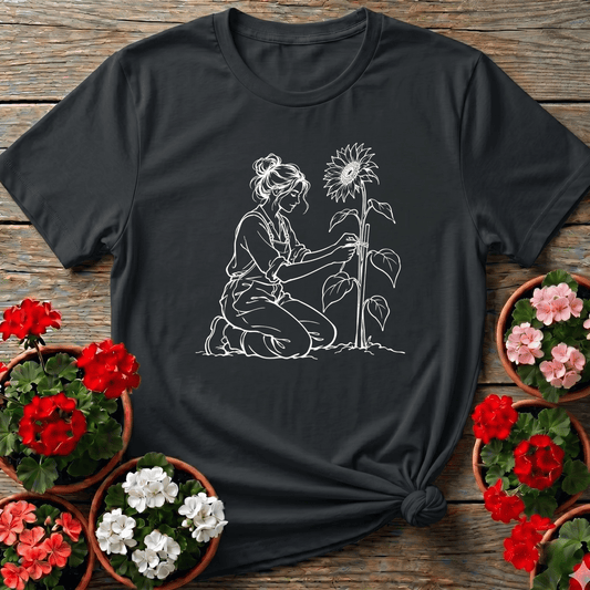 Black minimalist line art gardening tee with woman staking a sunflower for plant-loving women