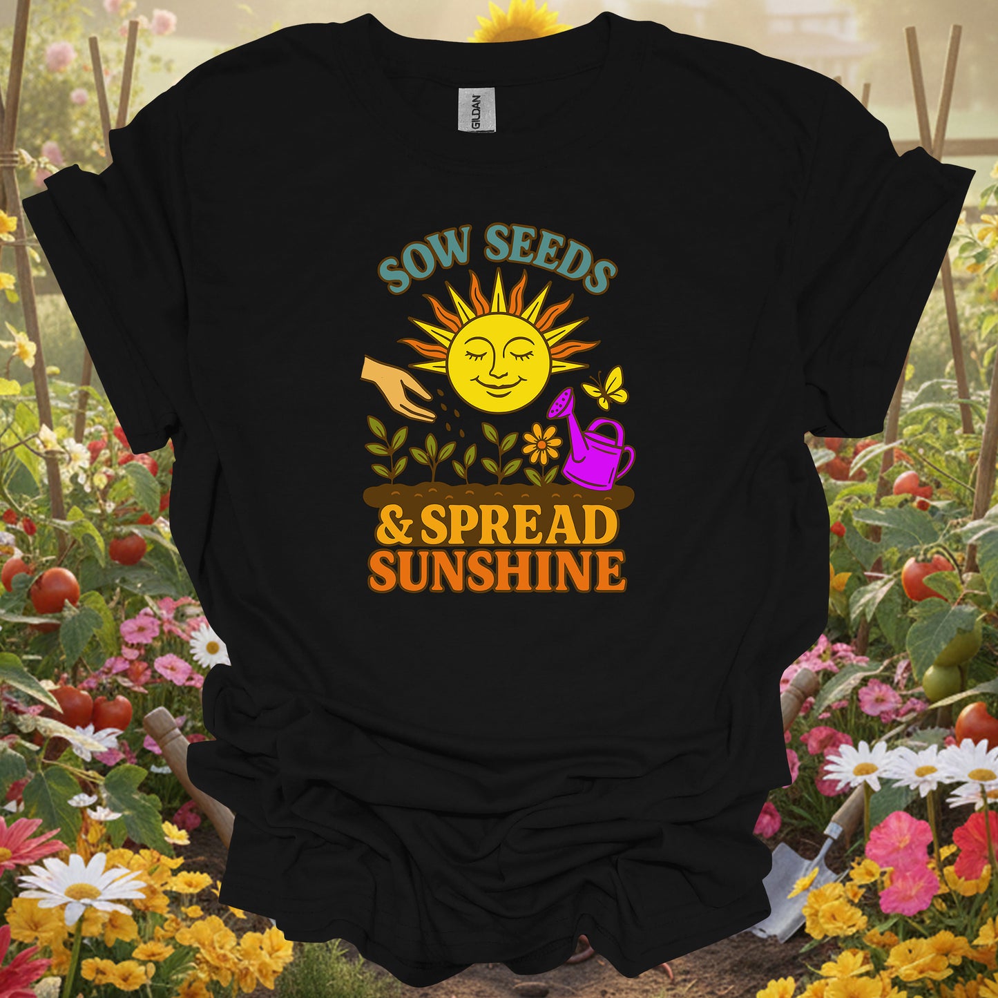 Black t-shirt with a vibrant sunshine gardening theme that fits a modern slow-living garden aesthetic and lifestyle.