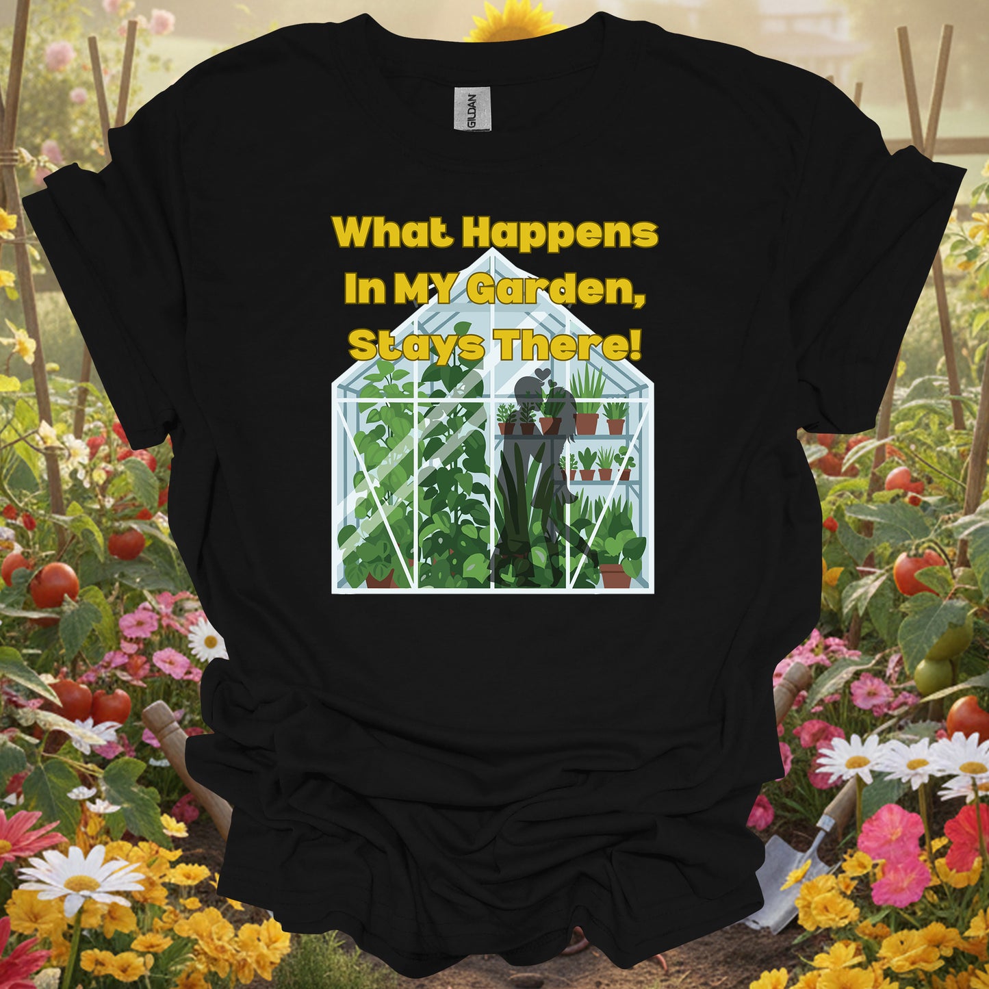 Black t-shirt with a detailed botanical illustration of a greenhouse interior for urban homesteaders.