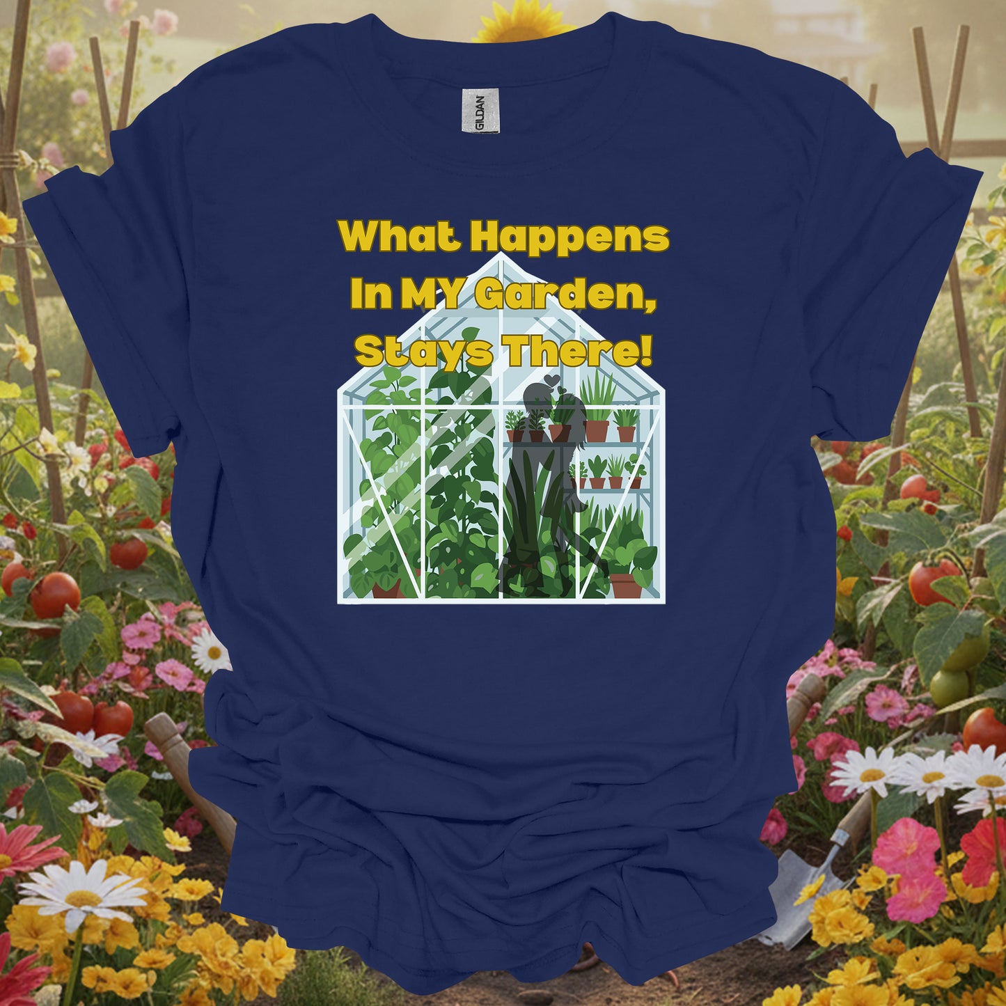Navy top showcasing a retro storybook botanical graphic of a lush greenhouse filled with climbing vines.