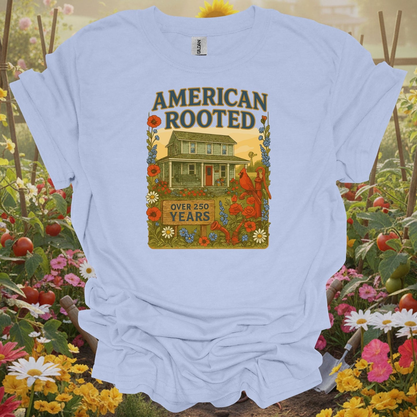 Light Blue tee with a vibrant illustration of a legacy farmhouse and colorful wildflowers for multi-generational farmers.