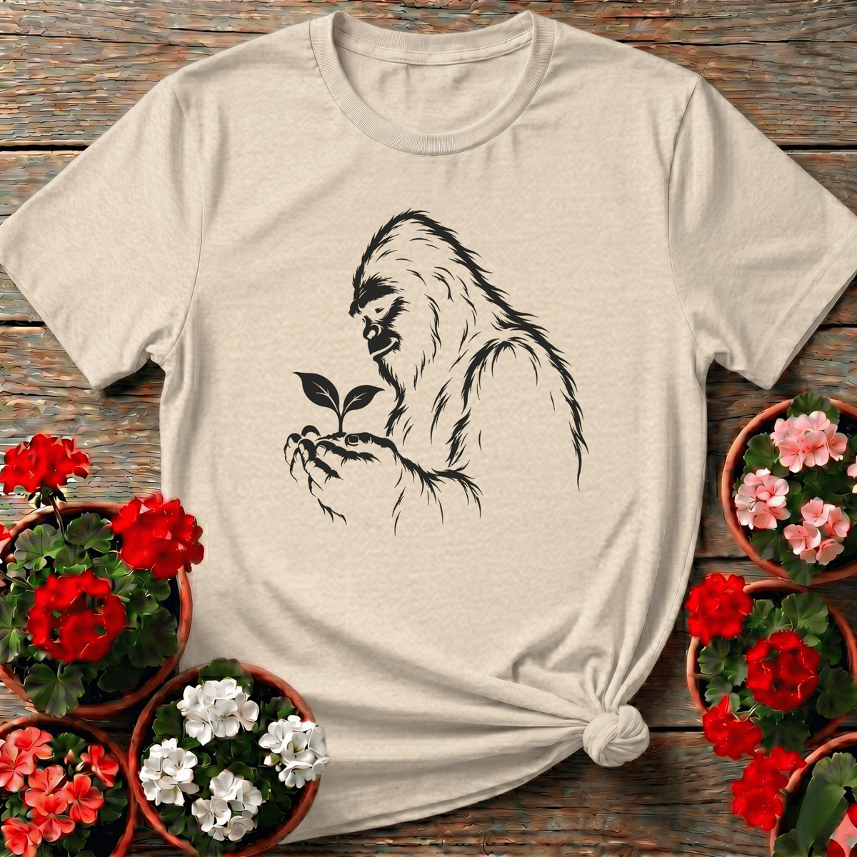 Bigfoot Holding a Seedling Gardening T-Shirt - GardeningTshirts