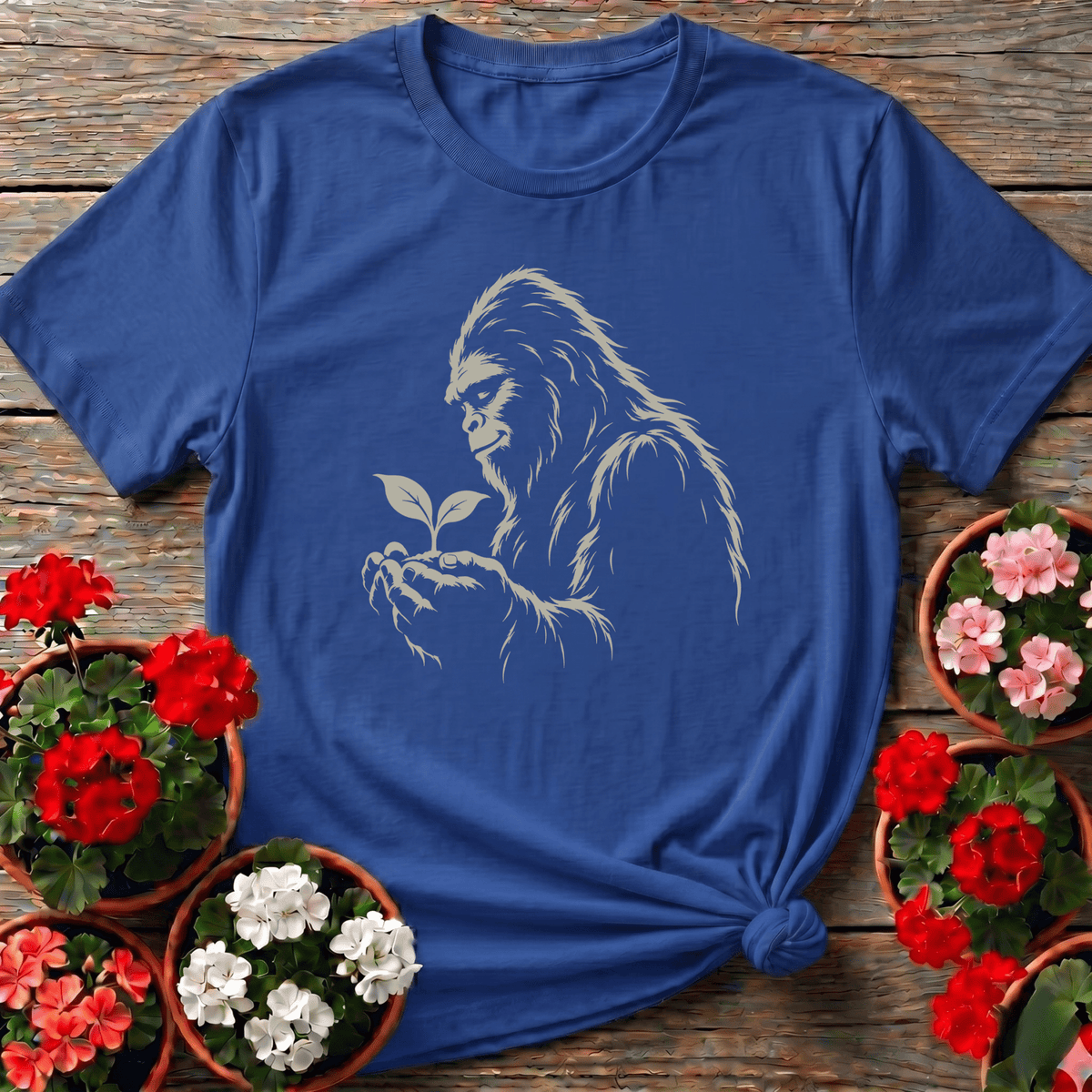 Bigfoot Holding a Seedling Gardening T-Shirt - GardeningTshirts