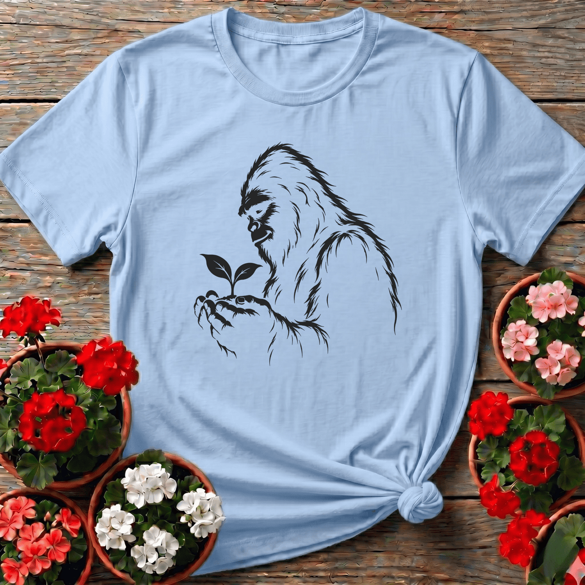 Bigfoot Holding a Seedling Gardening T-Shirt - GardeningTshirts
