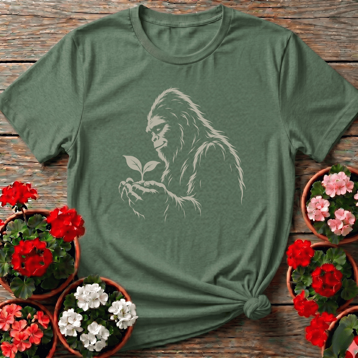 Bigfoot Holding a Seedling Gardening T-Shirt - GardeningTshirts
