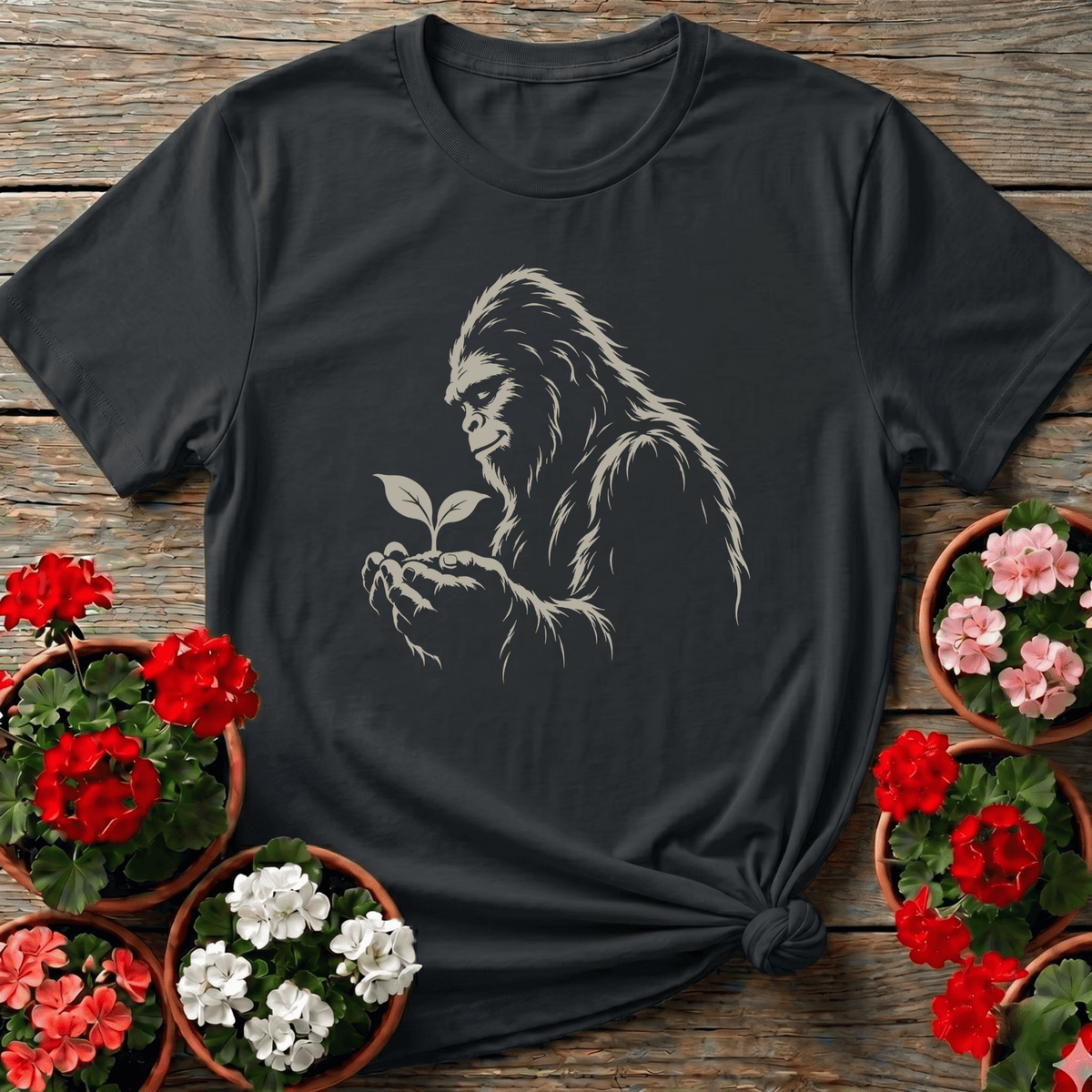 Bigfoot Holding a Seedling Gardening T-Shirt - GardeningTshirts