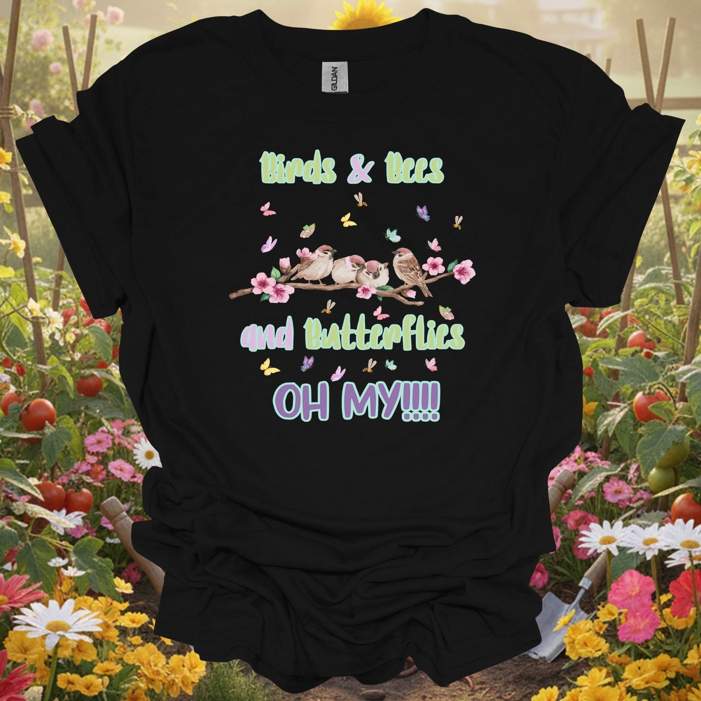 Black tshirt showing a playful, high-energy tribute to the creatures that thrive among your perennials and sunflowers for cold frame users hardening off transplants