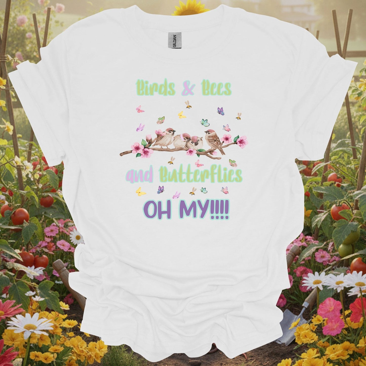 White tshirt showing a playful, high-energy tribute to the creatures that thrive among your perennials and sunflowers for cold frame users hardening off transplants