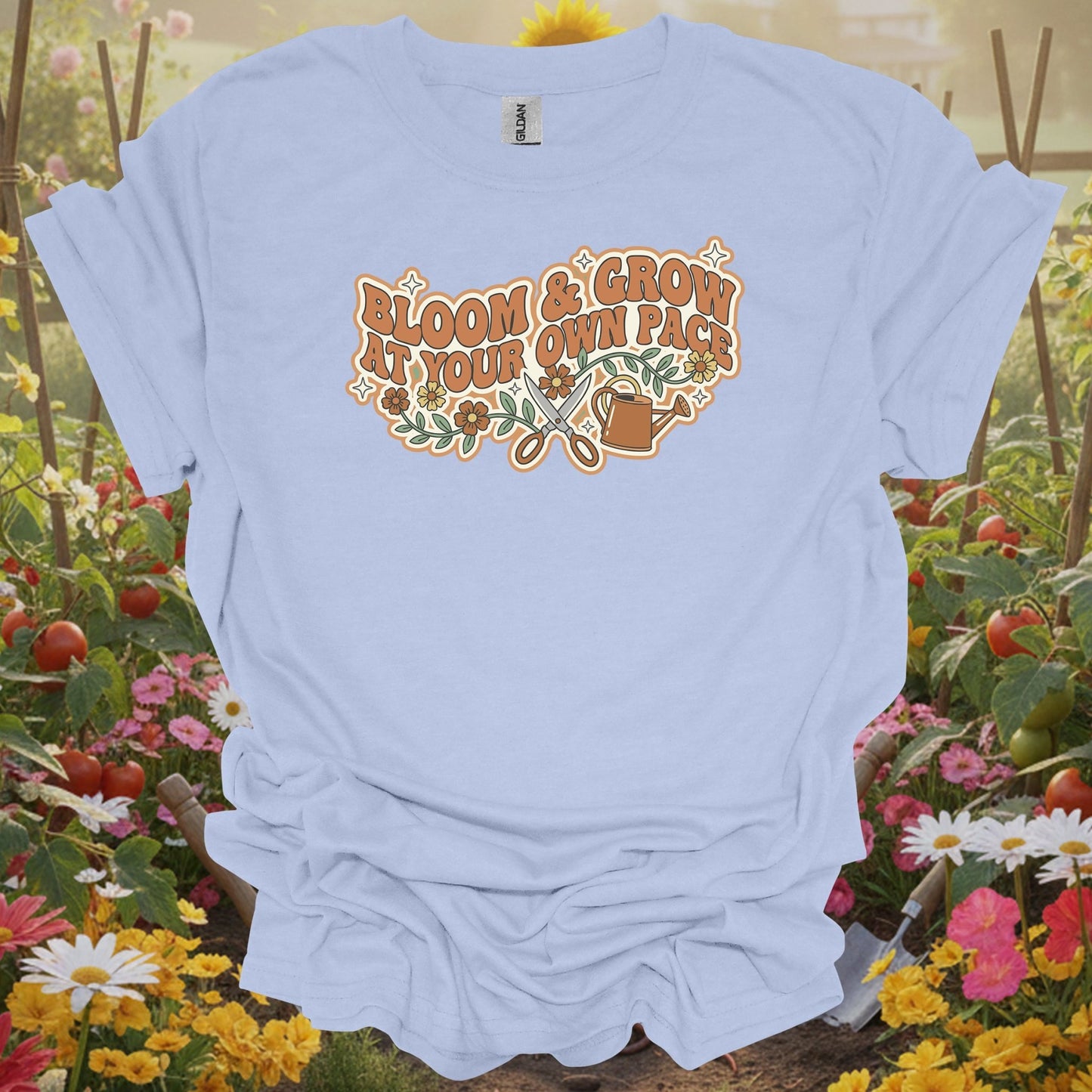 Light Blue shirt showing retro bloom and grow at your own pace gardening for classic garden lovers