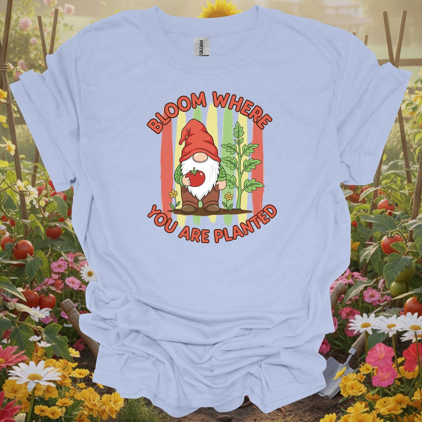 LIght blue tshirt showing a friendly garden gnome who represents the patient and resilient spirit of the soil for pet owners growing safe plants
