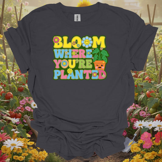 Charcoal tee showing retro smiley face with bloom where planted floral design for retro smiley fans