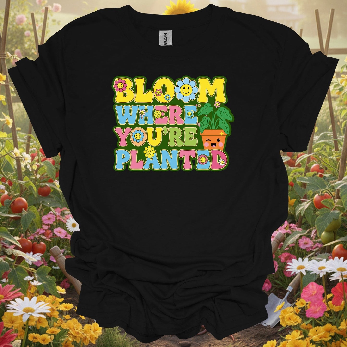 Black shirt showing retro smiley face with bloom where planted floral design for people thriving anywhere