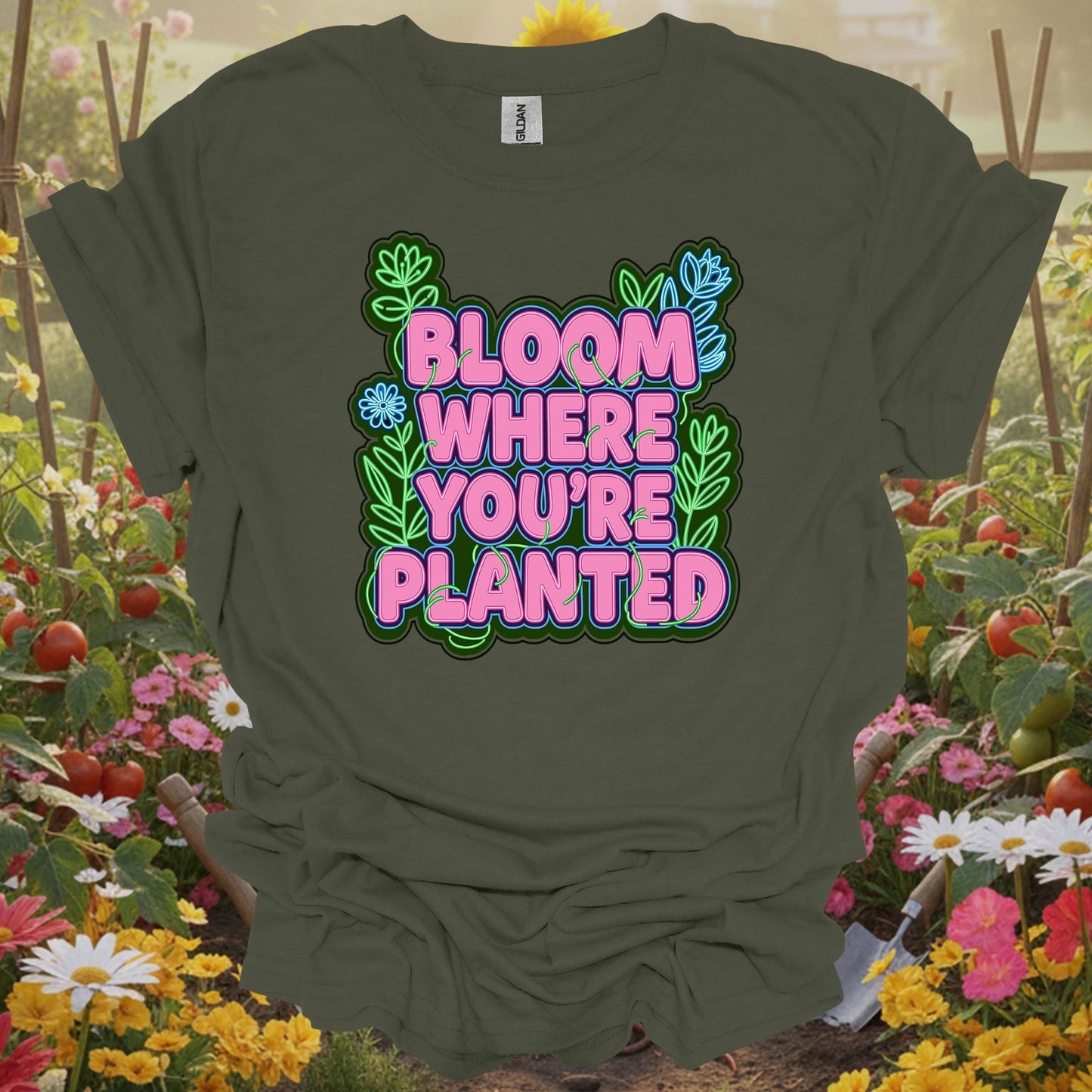 Military Green top showing bright bloom where you're planted text with plants for gardeners who need the reminder