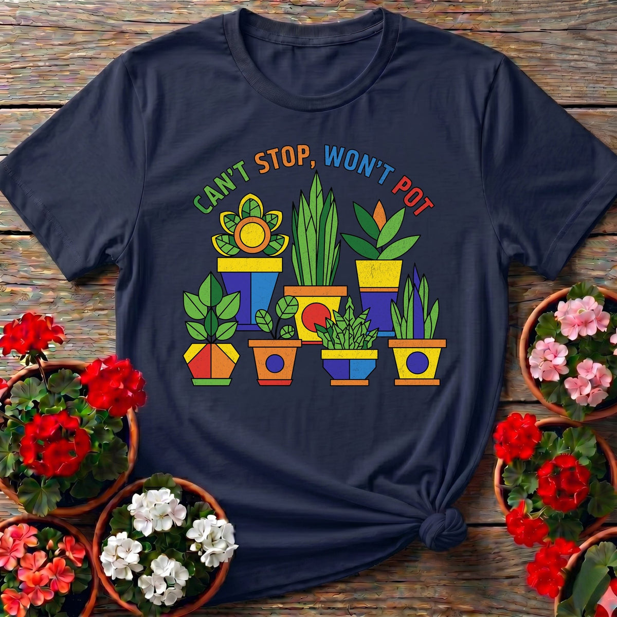 Navy vintage-feel t-shirt with "Can't Stop, Won't Pot" and bold illustrated houseplants for indoor gardeners