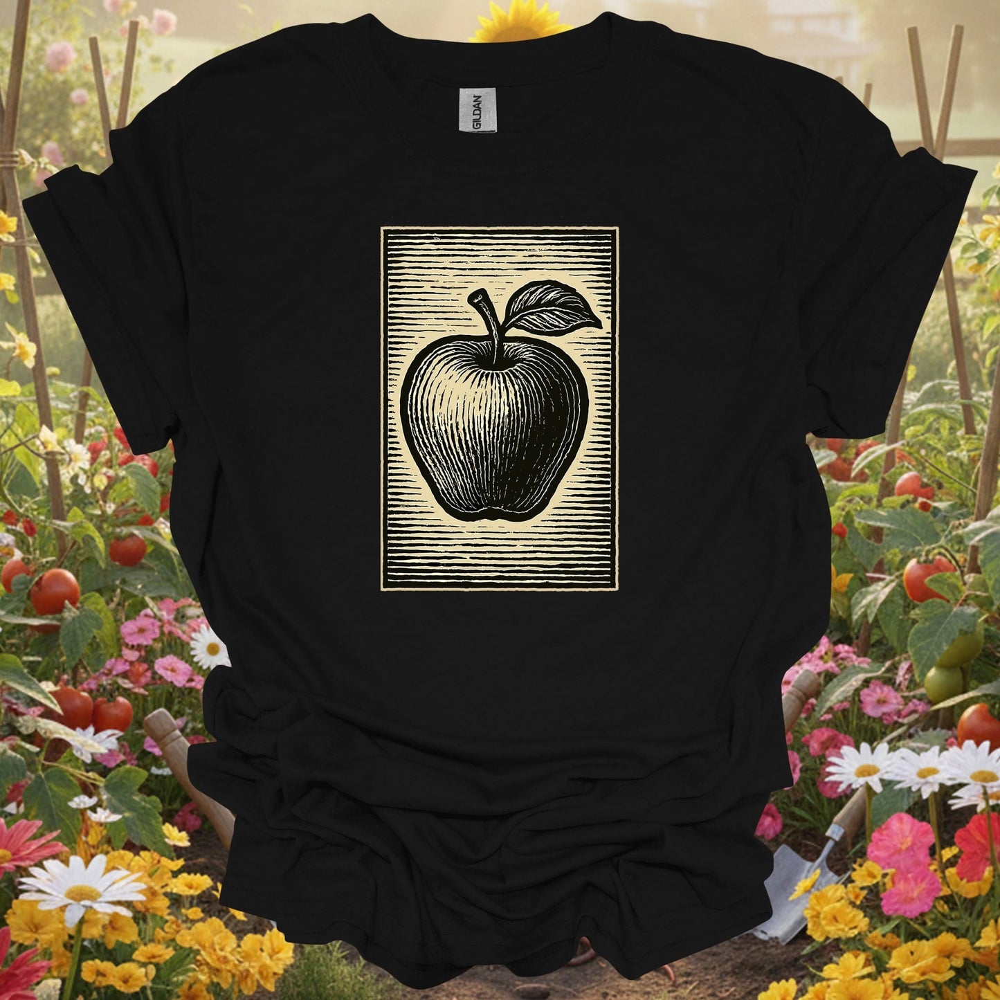 Black shirt showing classic linocut apple illustration garden for outdoor enthusiasts