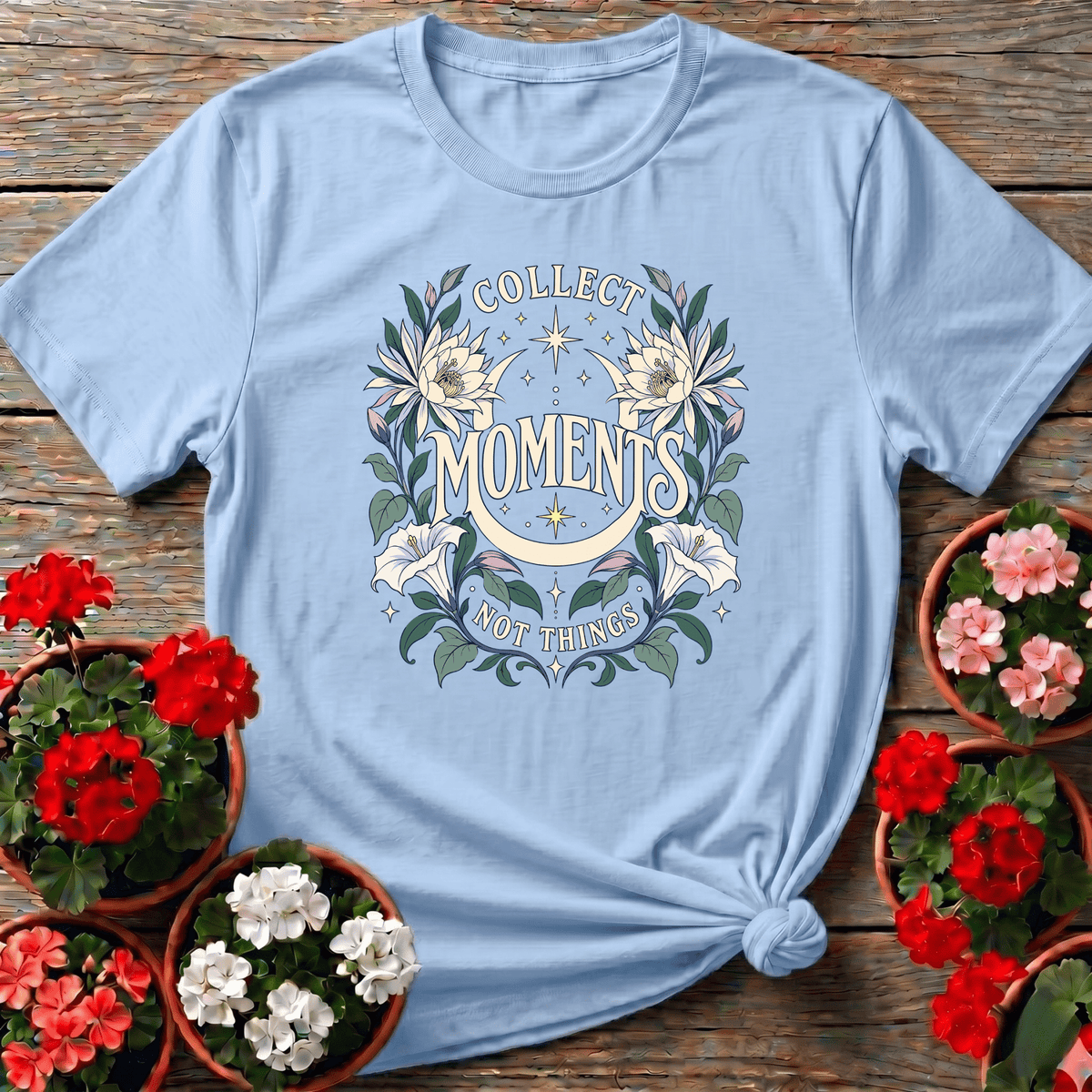 Light Blue moonlit botanical gardening top with "Collect Moments Not Things" floral crescent design for mindful gardeners