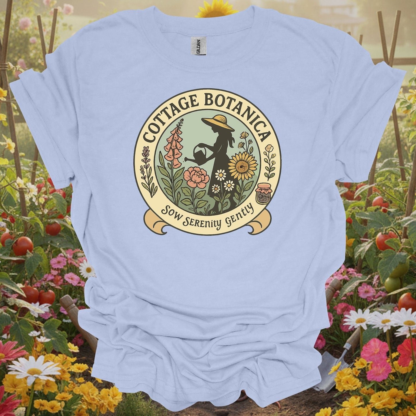 LIght blue shirt showing cottage botanica sow serenity gently gardening for home gardeners