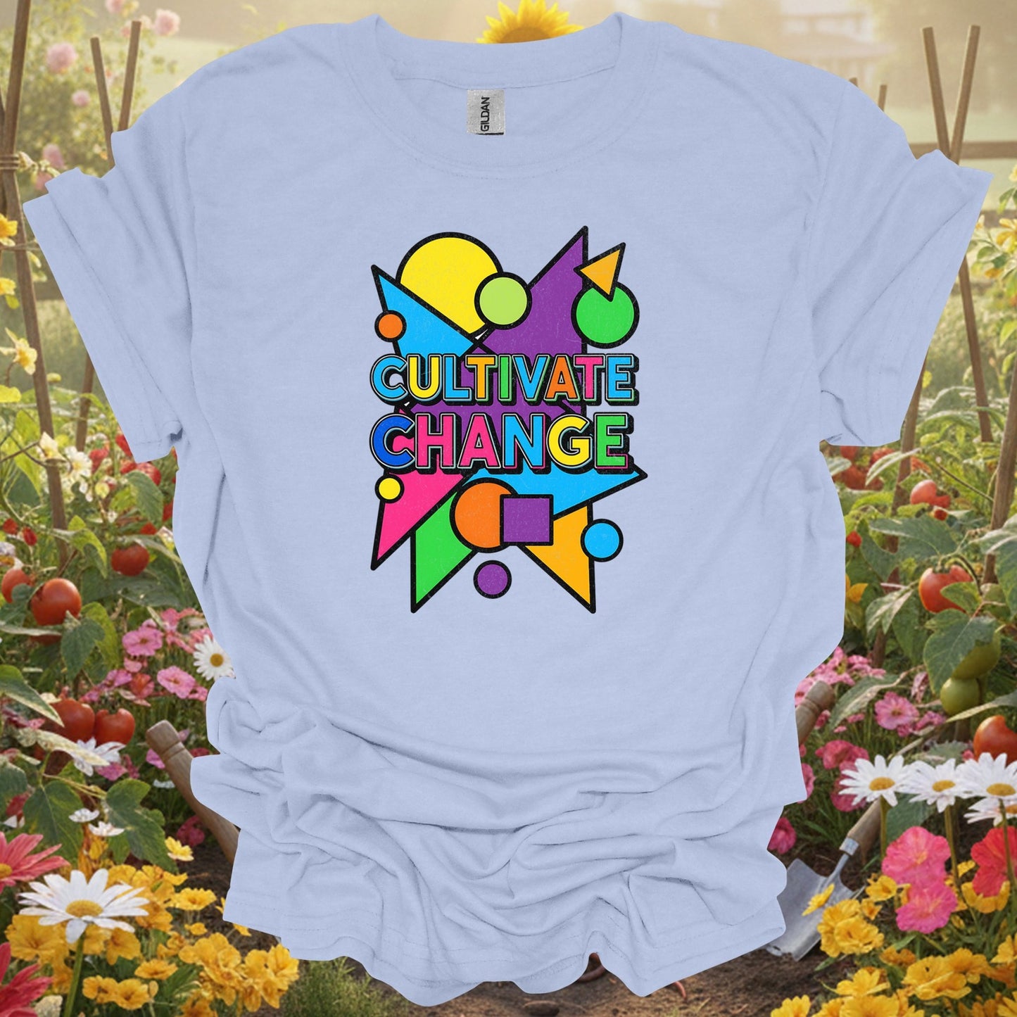 Light Blue shirt showing cultivate change bold motivational slogan for home gardeners