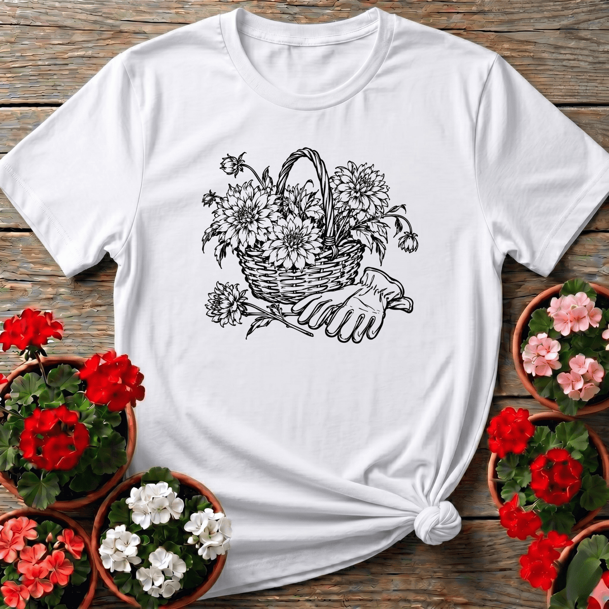 White cottagecore sketched dahlia basket gardening shirt with gloved hand illustration for slow-living gardeners