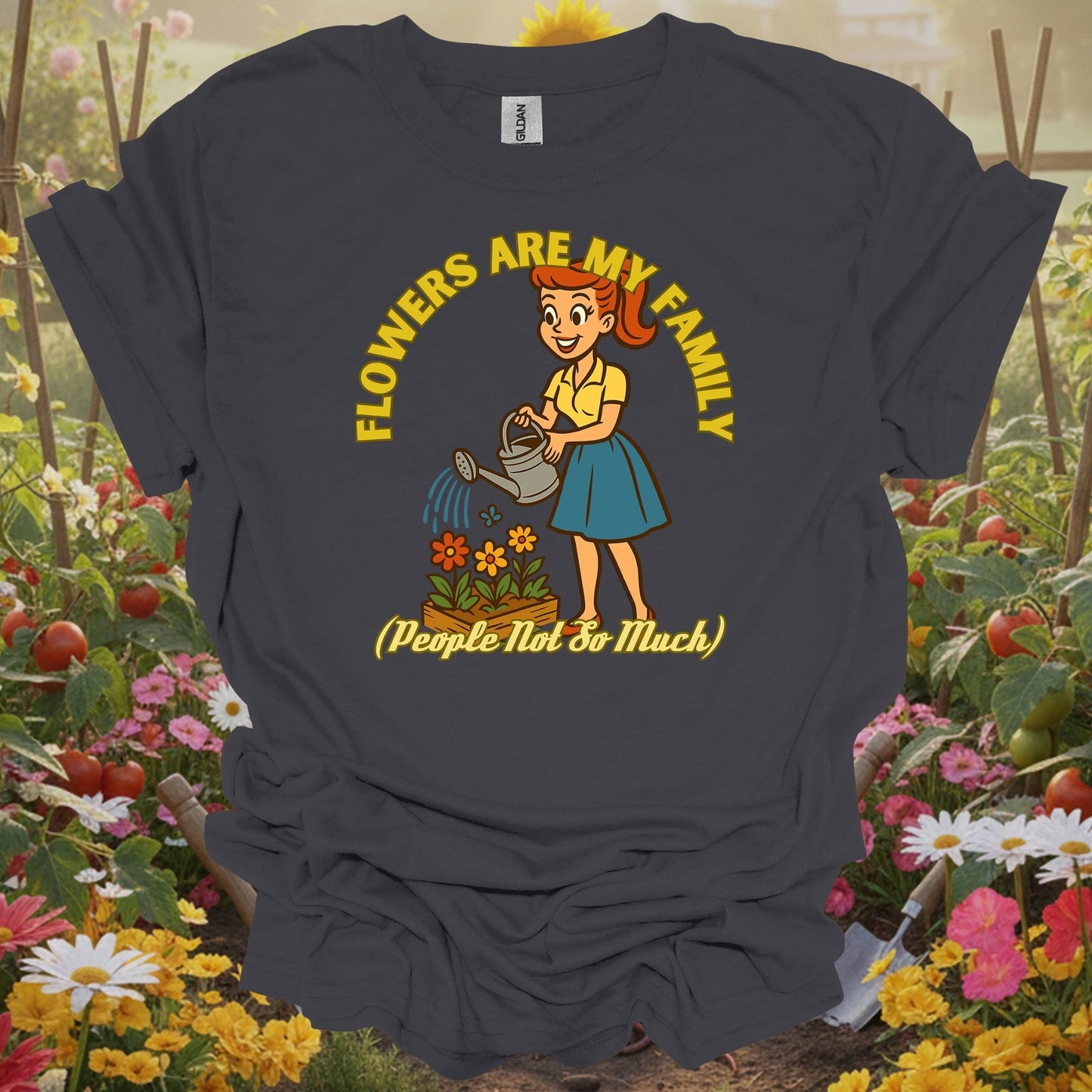 Charcoal tshirt showing a retro storybook woman watering flowers with Flowers Are My Family for introverted gardeners