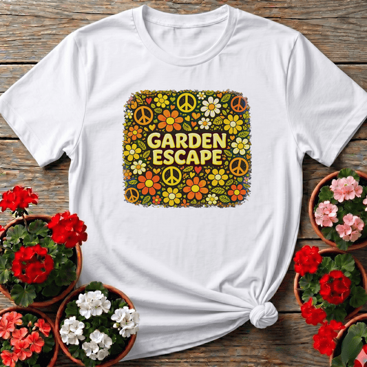 White 70s-style cottagecore gardening shirt with "Garden Escape" bold lettering and retro sunflower peace sign pattern