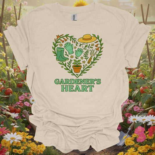 Natural tshirt showing a classic pair of boots and essential tools arranged in a symbol of affection for the earth for beautifiers creating floral displays