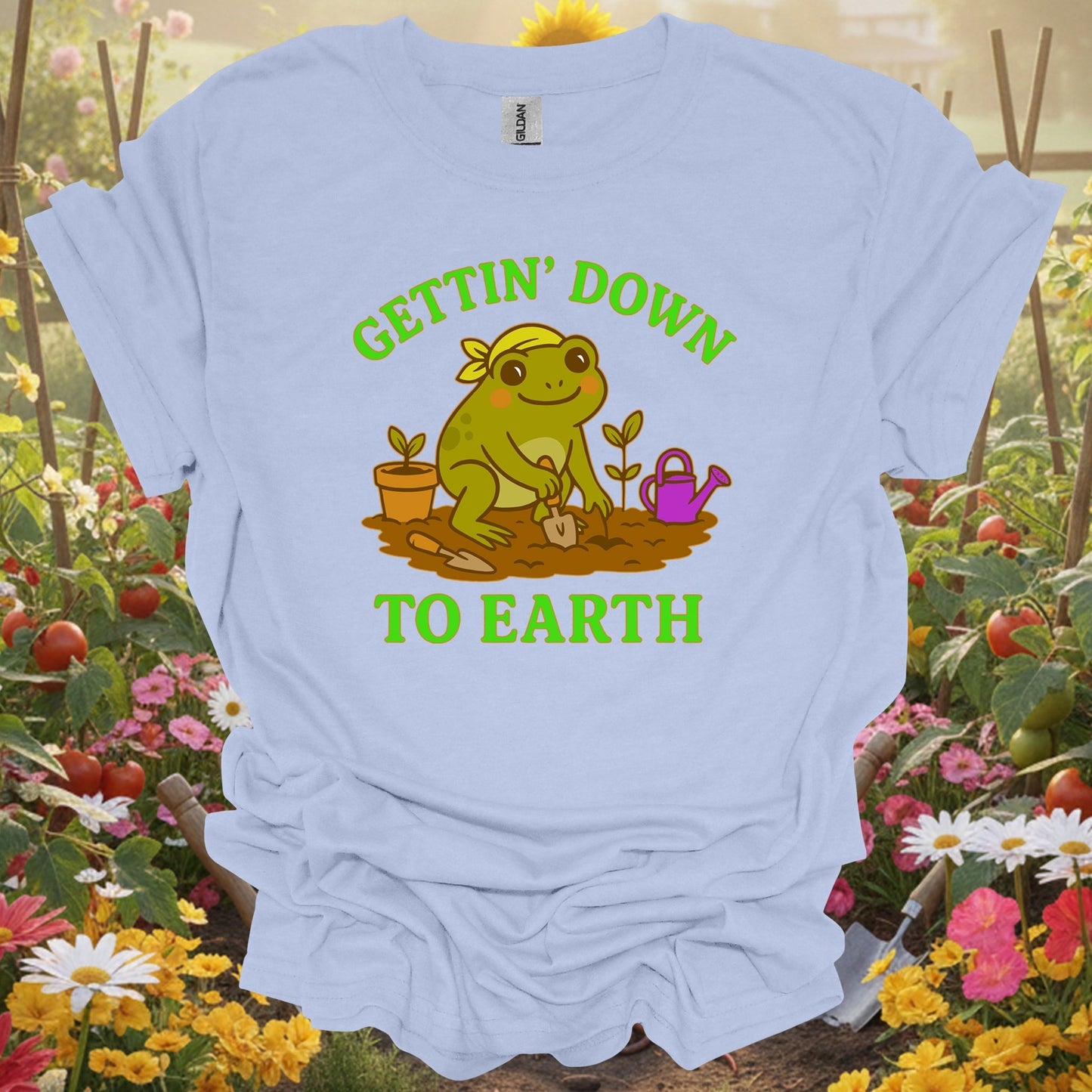 Light Blue shirt showing gettin down to earth cute frog for home gardeners