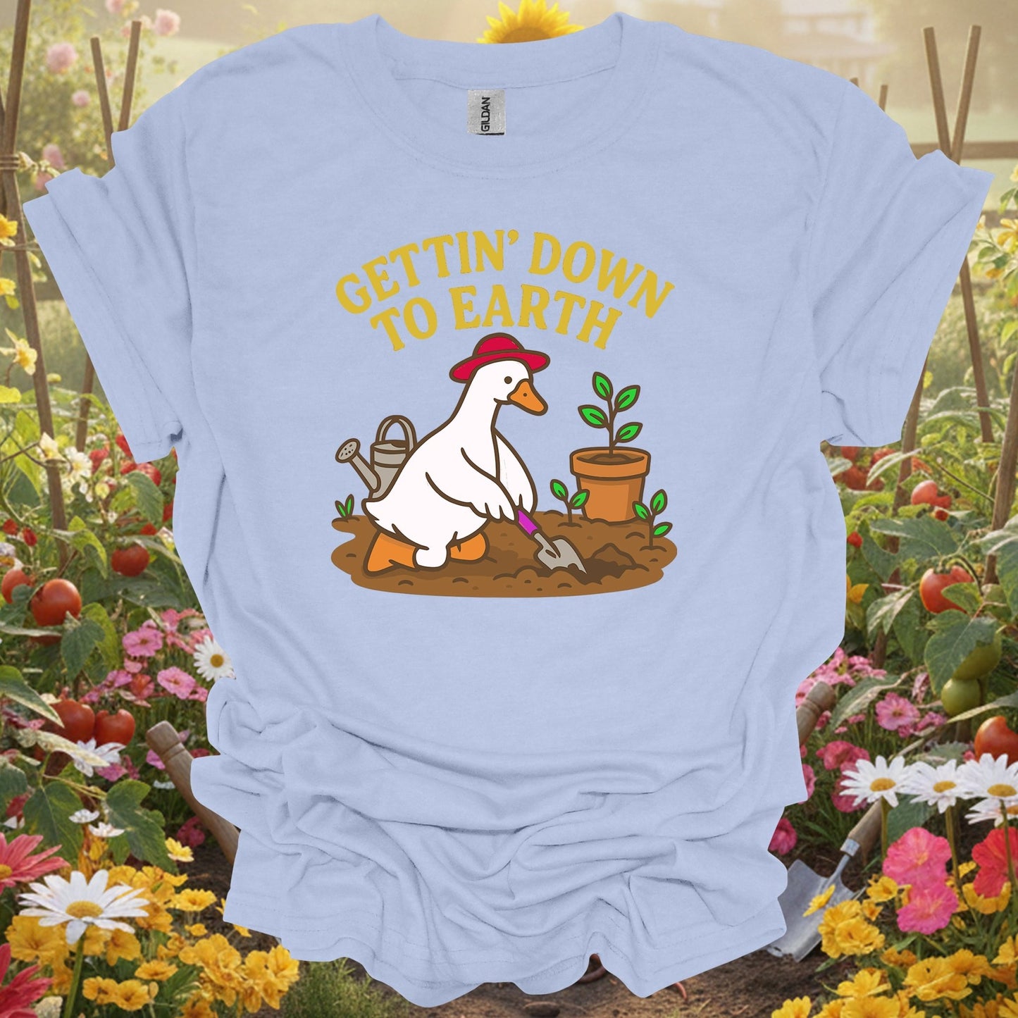Light Blue shirt showing gettin' down to earth cute goose t shirt for home gardeners