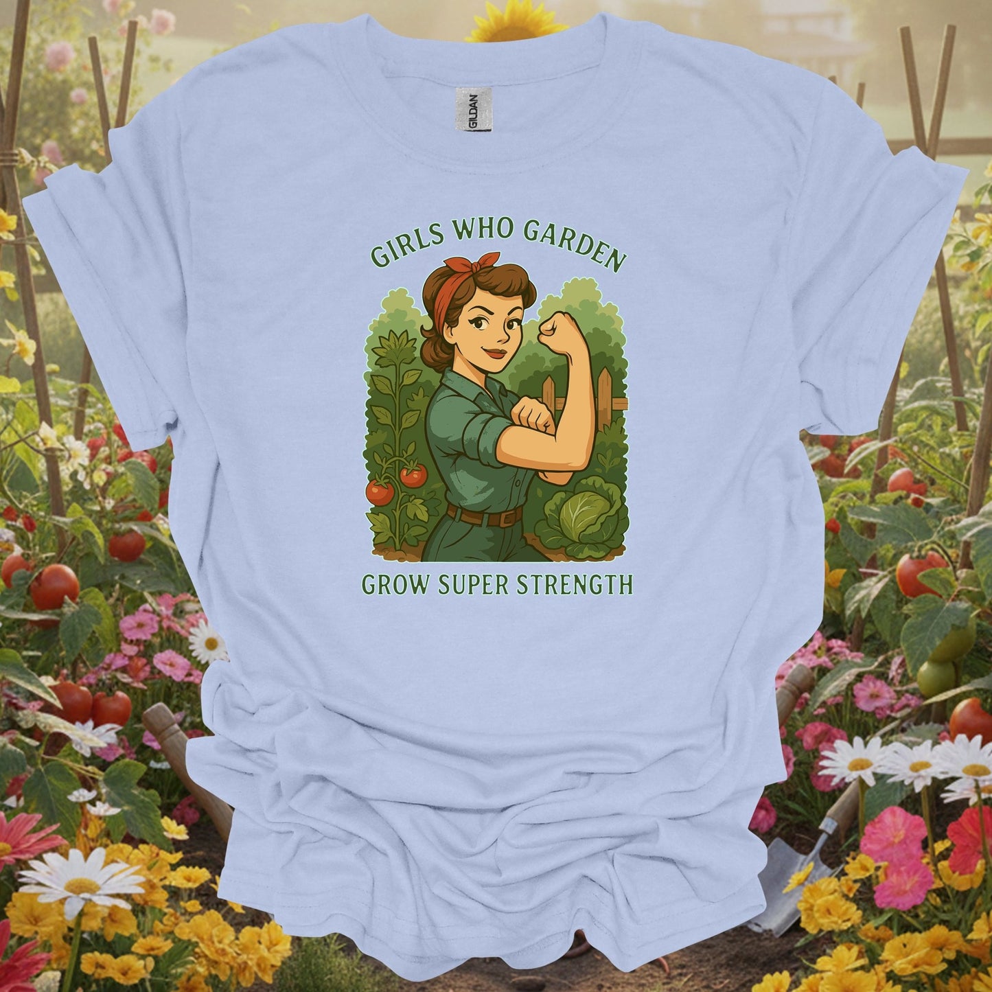 Light Blue tee showing bold retro strong woman gardener illustration for women who do the heavy lifting