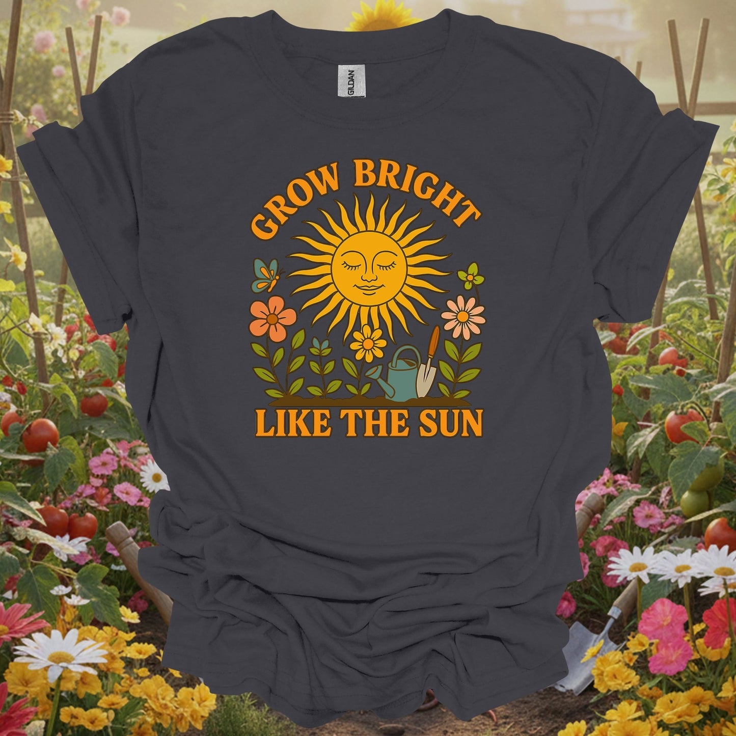 Charcoal tee featuring a smiling sun and seedling design that celebrates growing bright like the sun on a comfortable T-shirt.