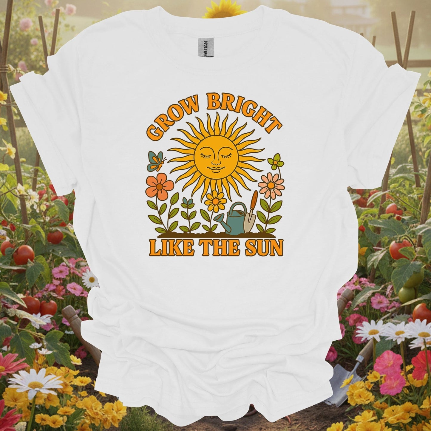 White shirt featuring a nostalgic sun and butterfly design on a classic tee for anyone who finds joy in their garden beds.