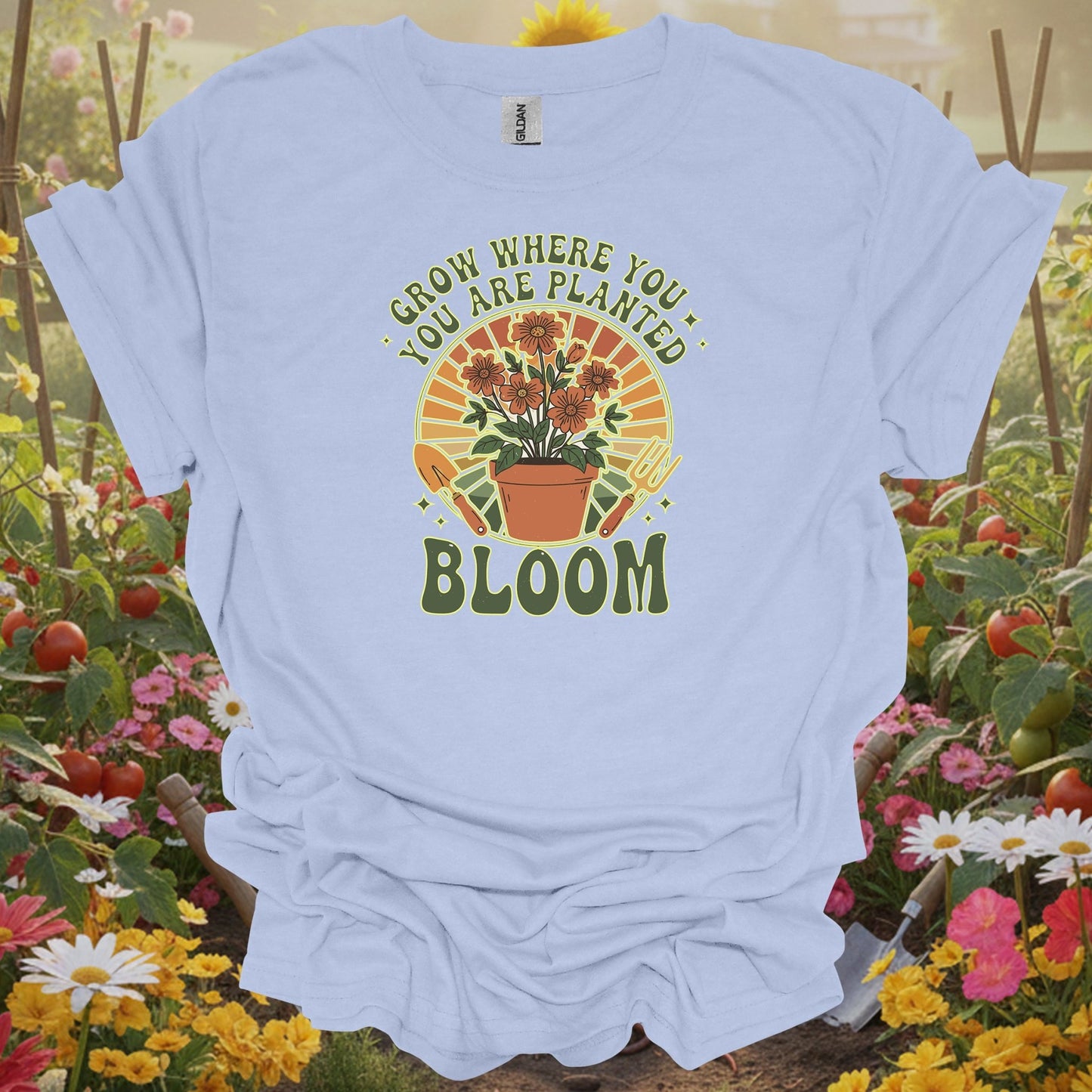 Light Blue shirt with a bloom gardening theme making a perfect inspirational gift T-shirt for any dedicated grower.
