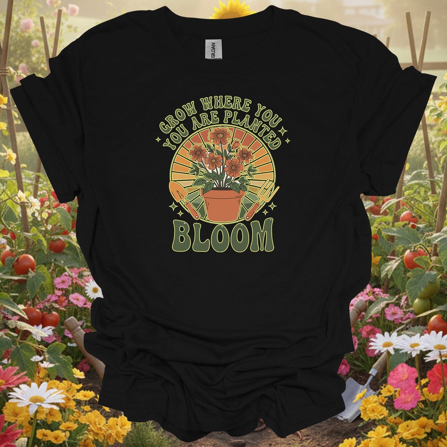 Black t-shirt with a vibrant sunburst theme that fits a modern slow-living garden lifestyle and earthy aesthetic.