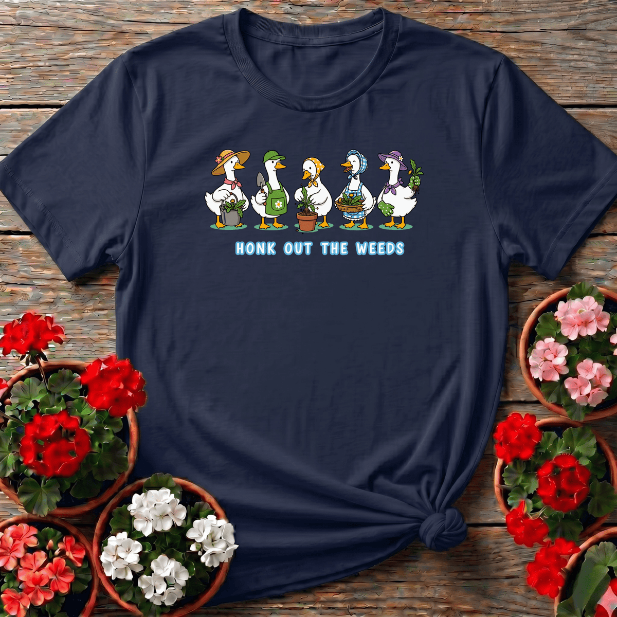 Navy cheerful illustrated gardening t-shirt "Honk Out the Weeds" with goose crew in hats and aprons for plant lovers