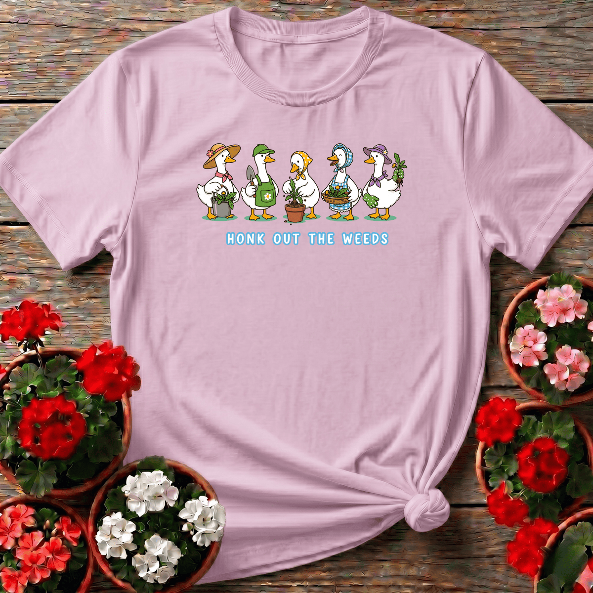 Light Pink cheerful cottagecore gardening apparel "Honk Out the Weeds" with five illustrated geese for garden gift giving