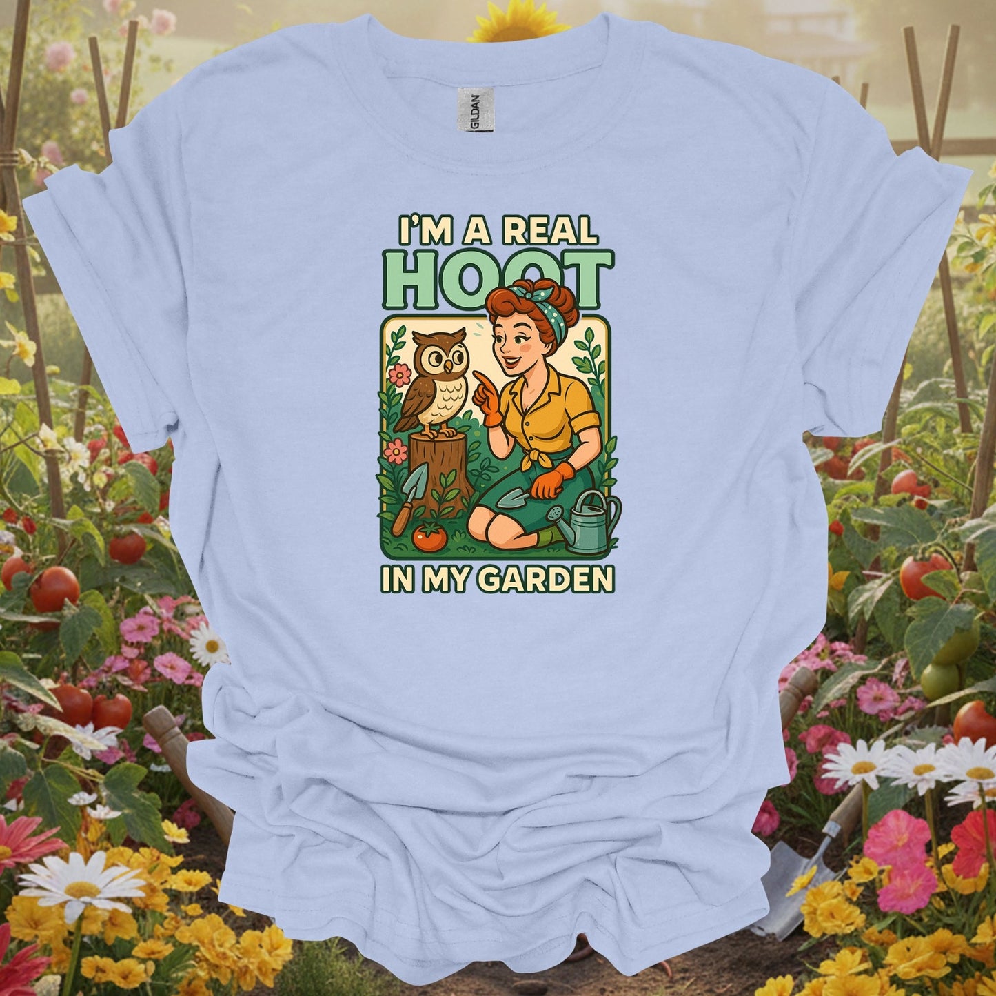 LIght blue tshirt showing a charming owl who represents the wise and slightly cynical spirit of a veteran gardener for empty nesters redesigning garden spaces