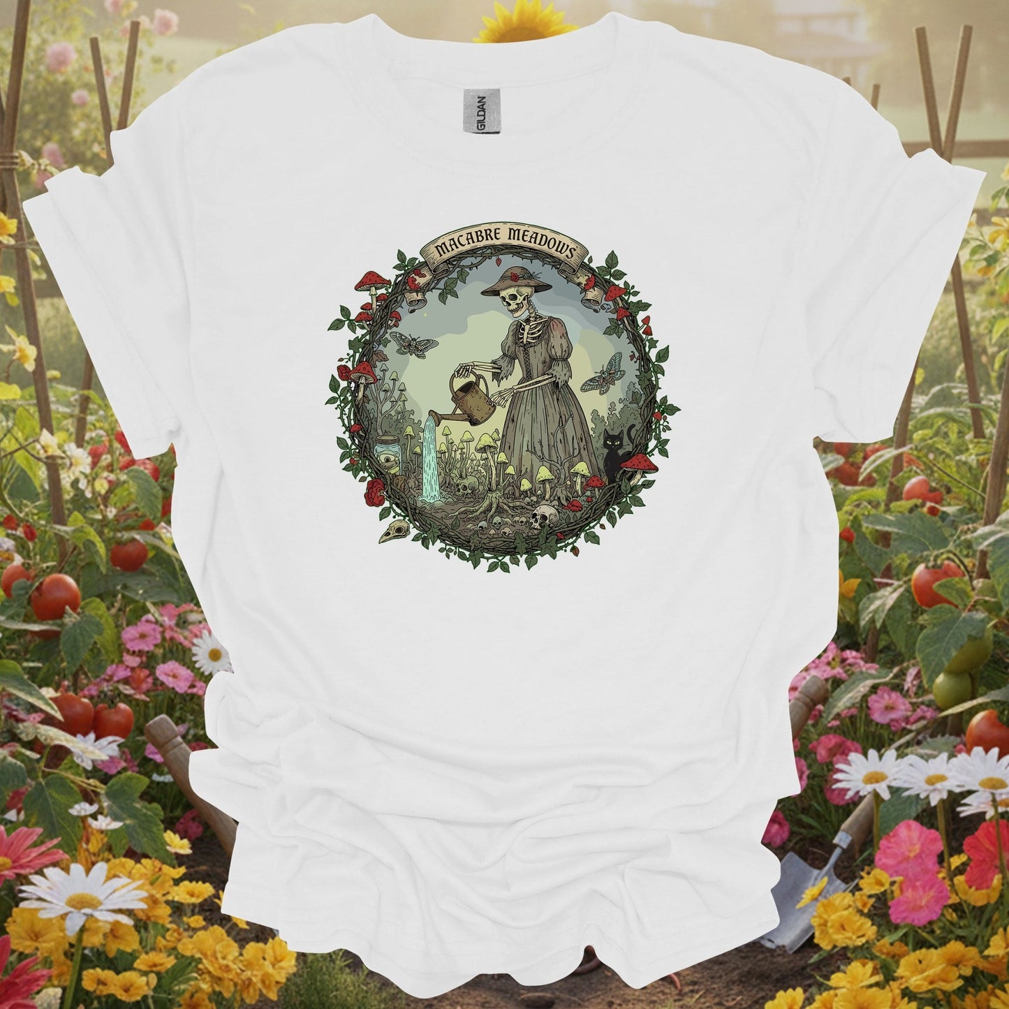 White tee showing gothic skeleton gardener in macabre meadows for goth garden keepers