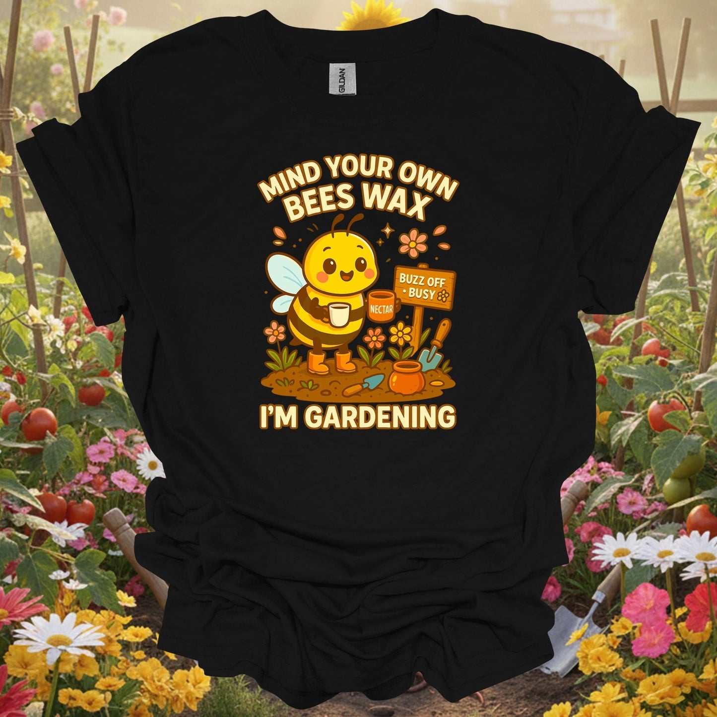Black top showing busy honeybee with mind your own beeswax message for bee-friendly gardeners