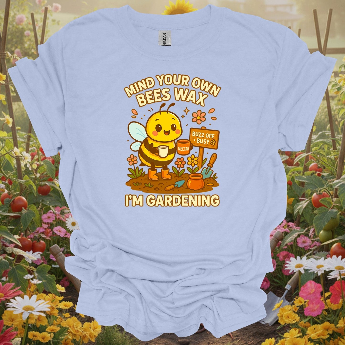 Light Blue shirt showing busy honeybee with mind your own beeswax message for private gardeners