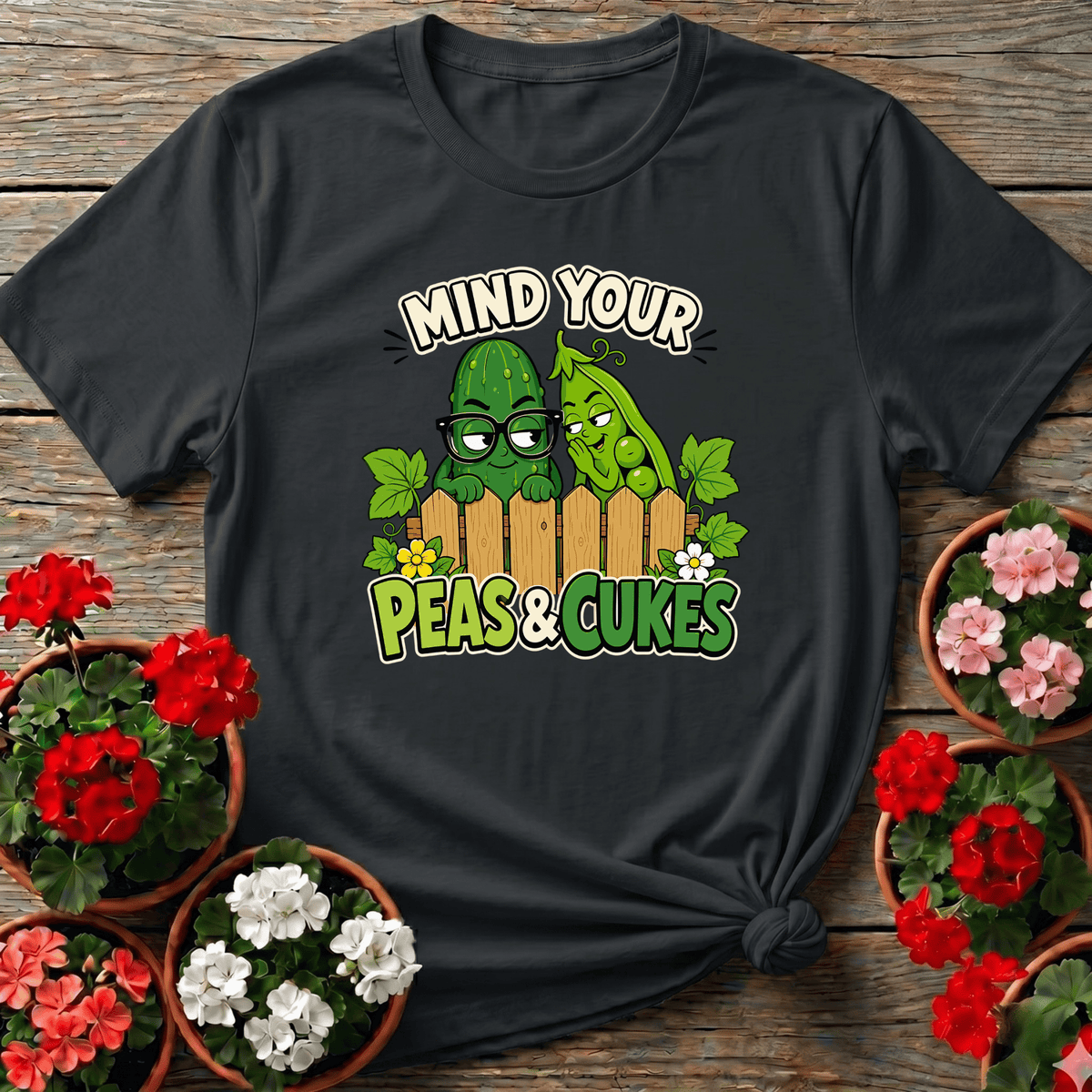 Black retro cartoon vegetable gardening tee with "Mind Your Peas and Cukes" for dry-humored gardeners