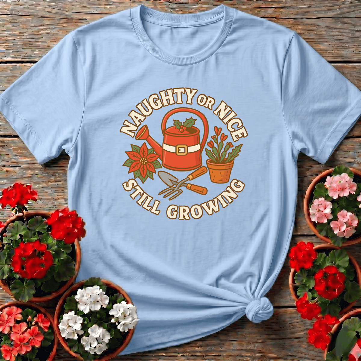 Light Blue festive retro gardening top with poinsettia and trowel design for holiday plant lovers