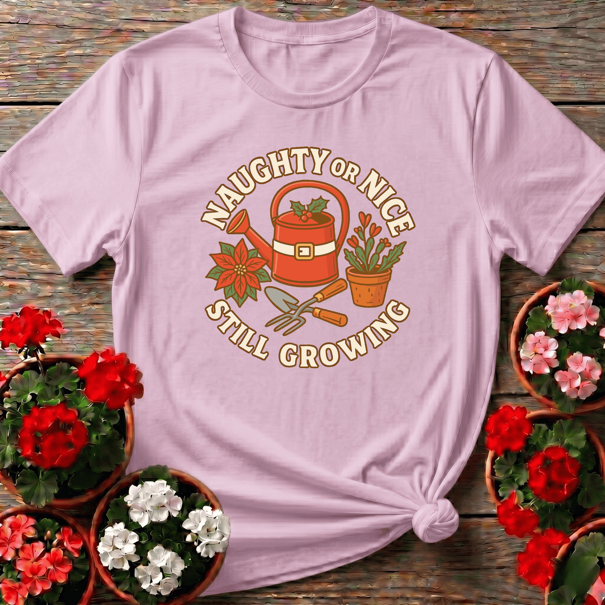 Light Pink festive vintage gardening tee "Naughty or Nice Still Growing" for holiday plant enthusiasts