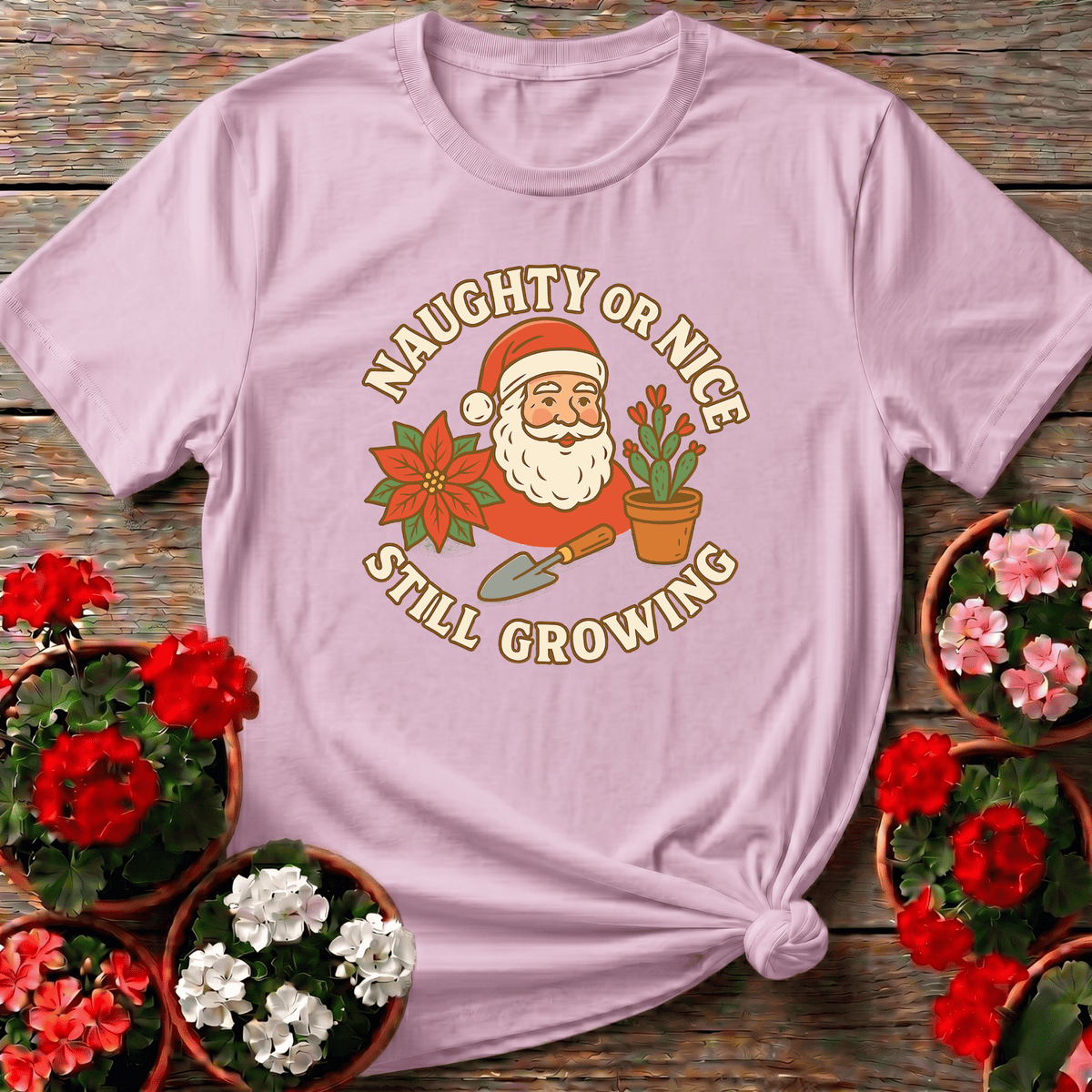 Light Pink cottagecore retro Christmas gardening tee with "Naughty or Nice Still Growing" for her