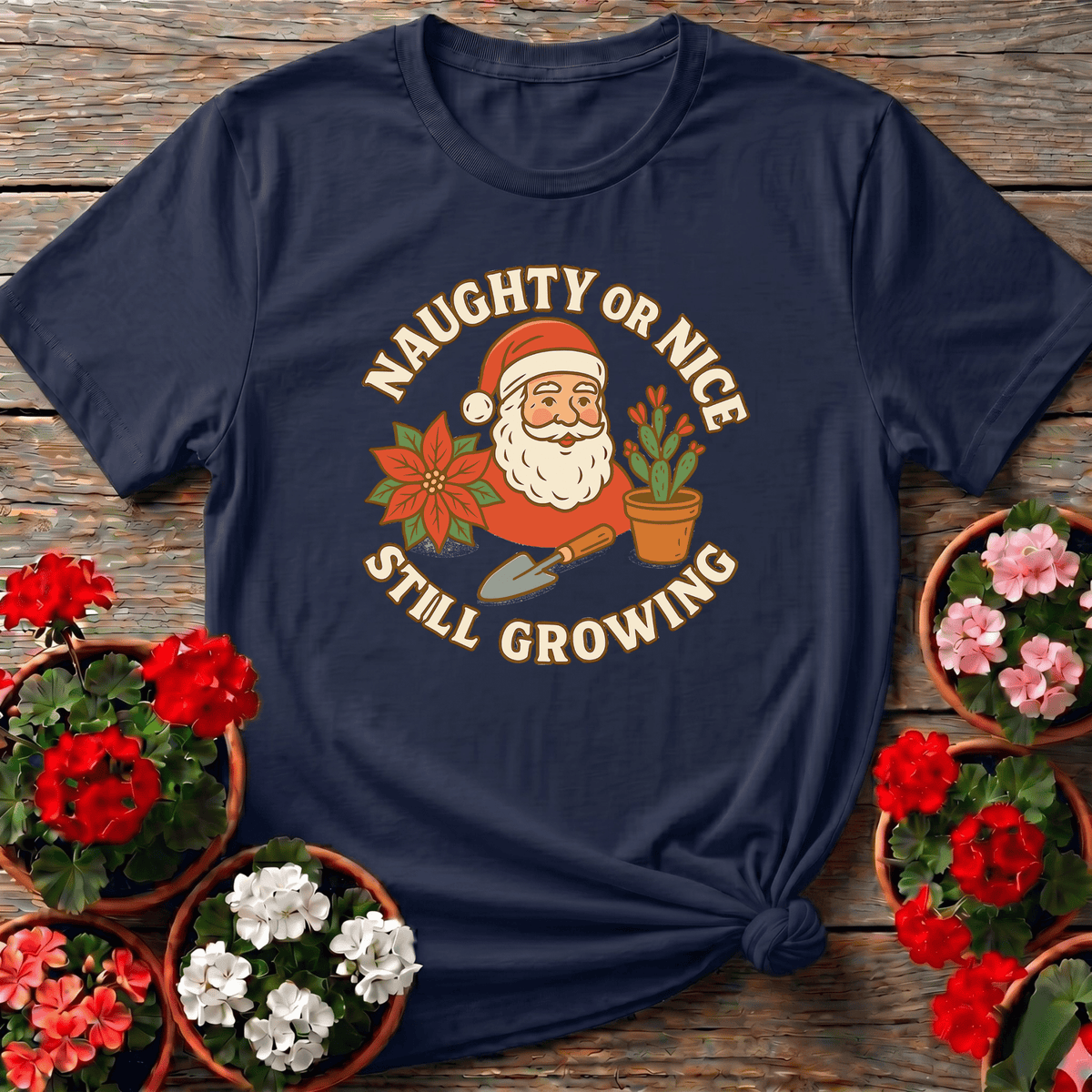 Navy retro Americana Christmas gardening t-shirt with "Naughty or Nice Still Growing" for gardeners