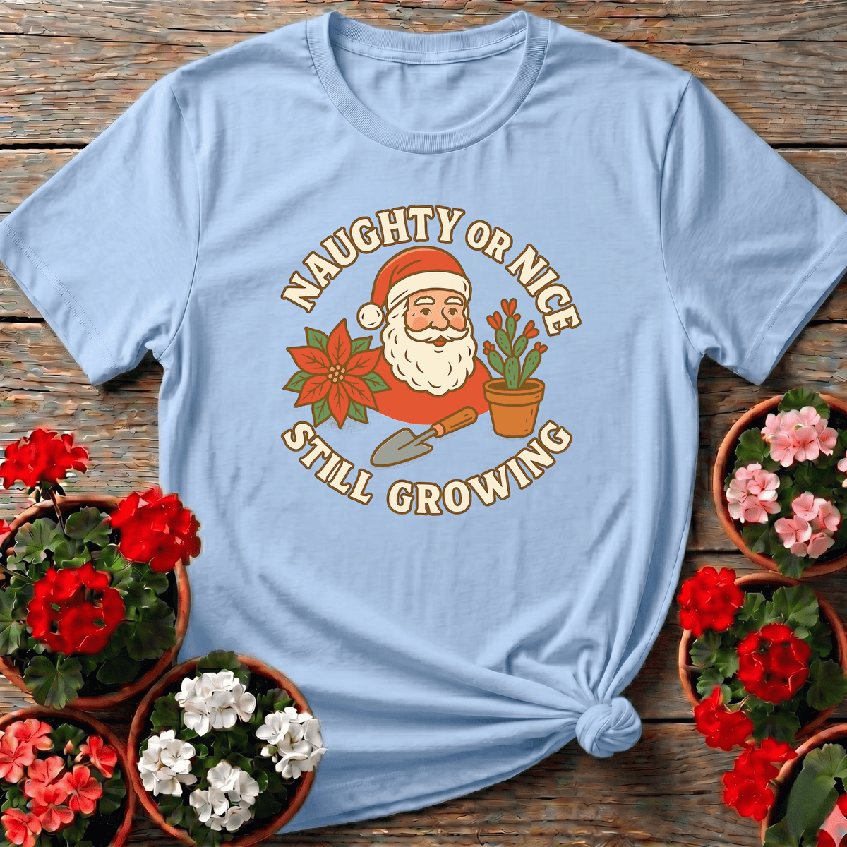 Light Blue cottagecore holiday gardening top with retro Santa poinsettia and terracotta cactus design