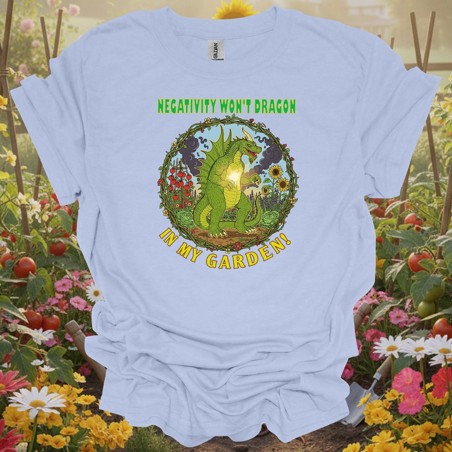 Light Blue shirt showing negativity won't dragon in my garden pun for home gardeners