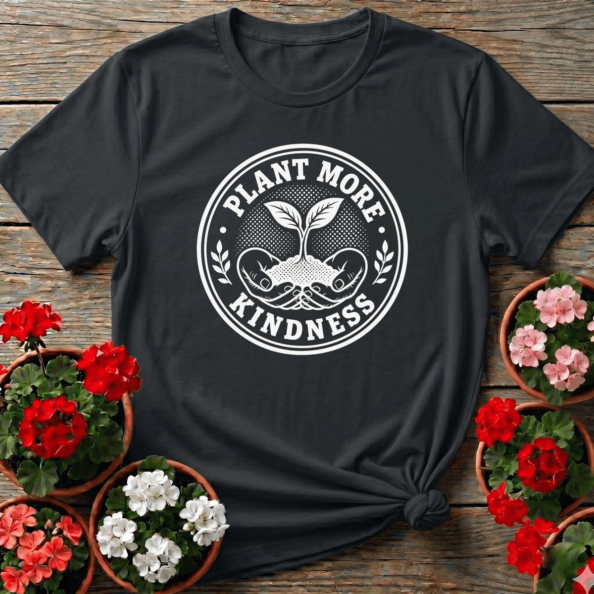 Black retro badge gardening tee with "Plant More Kindness" and seedling graphic for garden lovers